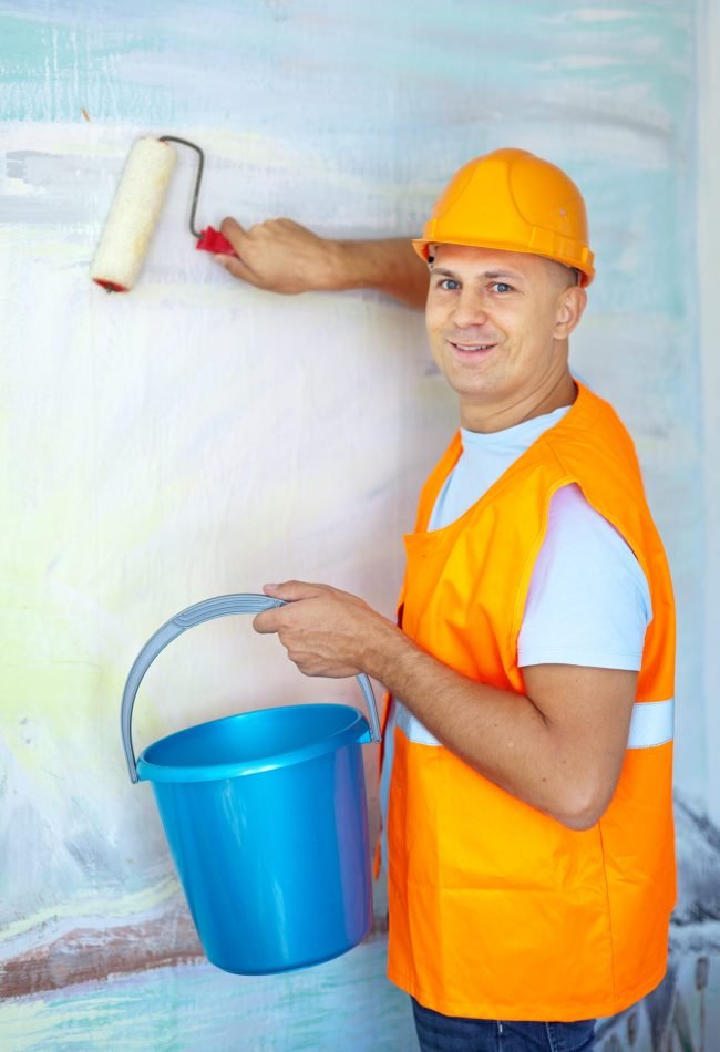 house painters with paint roller is ready for operation